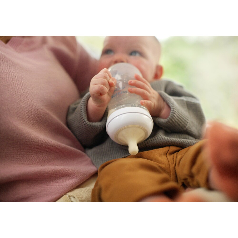 Set 4 biberoane PHILIPS AVENT Natural Response SCY903/04, flux mediu, 3 luni+, 260ml, alb-transparent