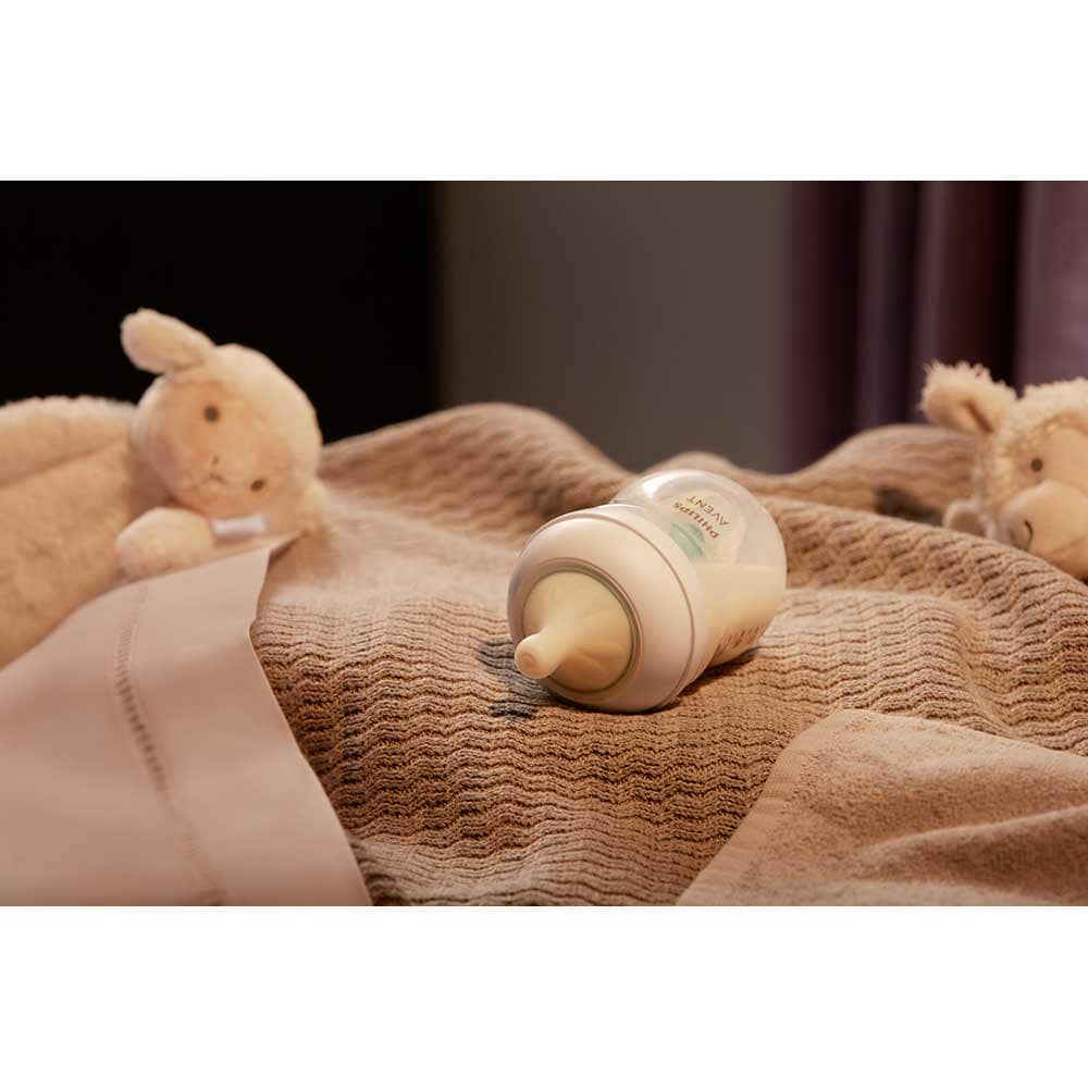 Set PHILIPS AVENT Natural Response SCD657/11: 2 biberoane 125ml + 2 biberoane 260ml + 2 dispozitive AirFree + suzeta + perie biberon, flux lent, 0 luni+, multicolor