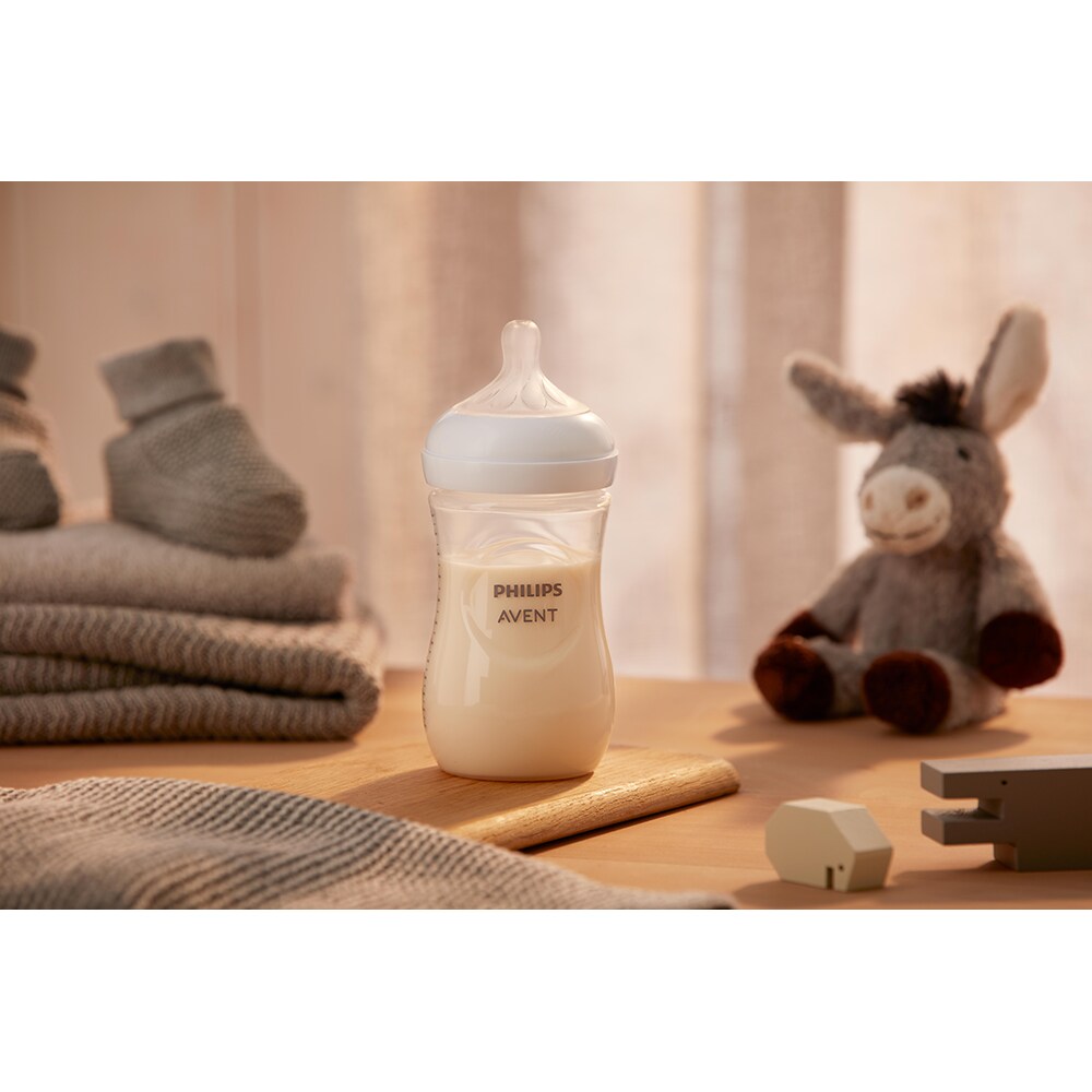 Set 4 biberoane PHILIPS AVENT Natural Response SCY903/04, flux mediu, 3 luni+, 260ml, alb-transparent